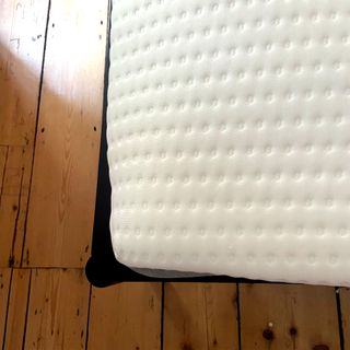 The Eve Wunderflip Lighter Hybrid mattress being tested