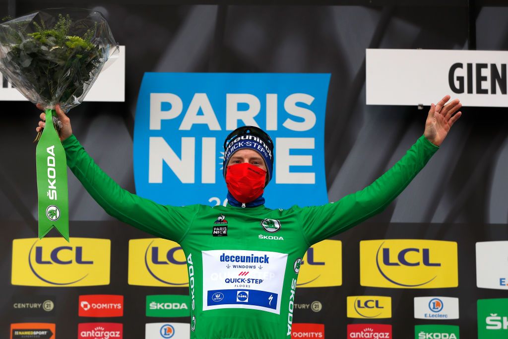 GIEN FRANCE MARCH 09 Podium Sam Bennett of Ireland and Team Deceuninck QuickStep Green Sprint Jersey Celebration during the 79th Paris Nice 2021 Stage 3 a 144km Individual Time Trial stage from Gien to Gien 147m ITT Trophy Mask Covid Safety Measures ParisNice on March 09 2021 in Gien France Photo by Bas CzerwinskiGetty Images