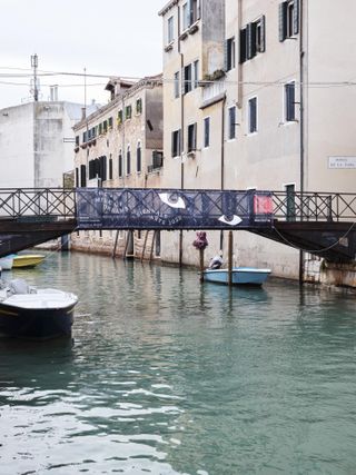 Venice Biennale graphic identity seen on bridge