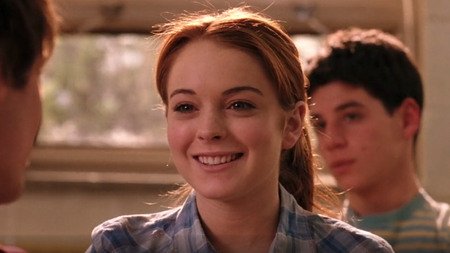 Lindsay Lohan as Cady Heron smiling while in class in Mean Girls