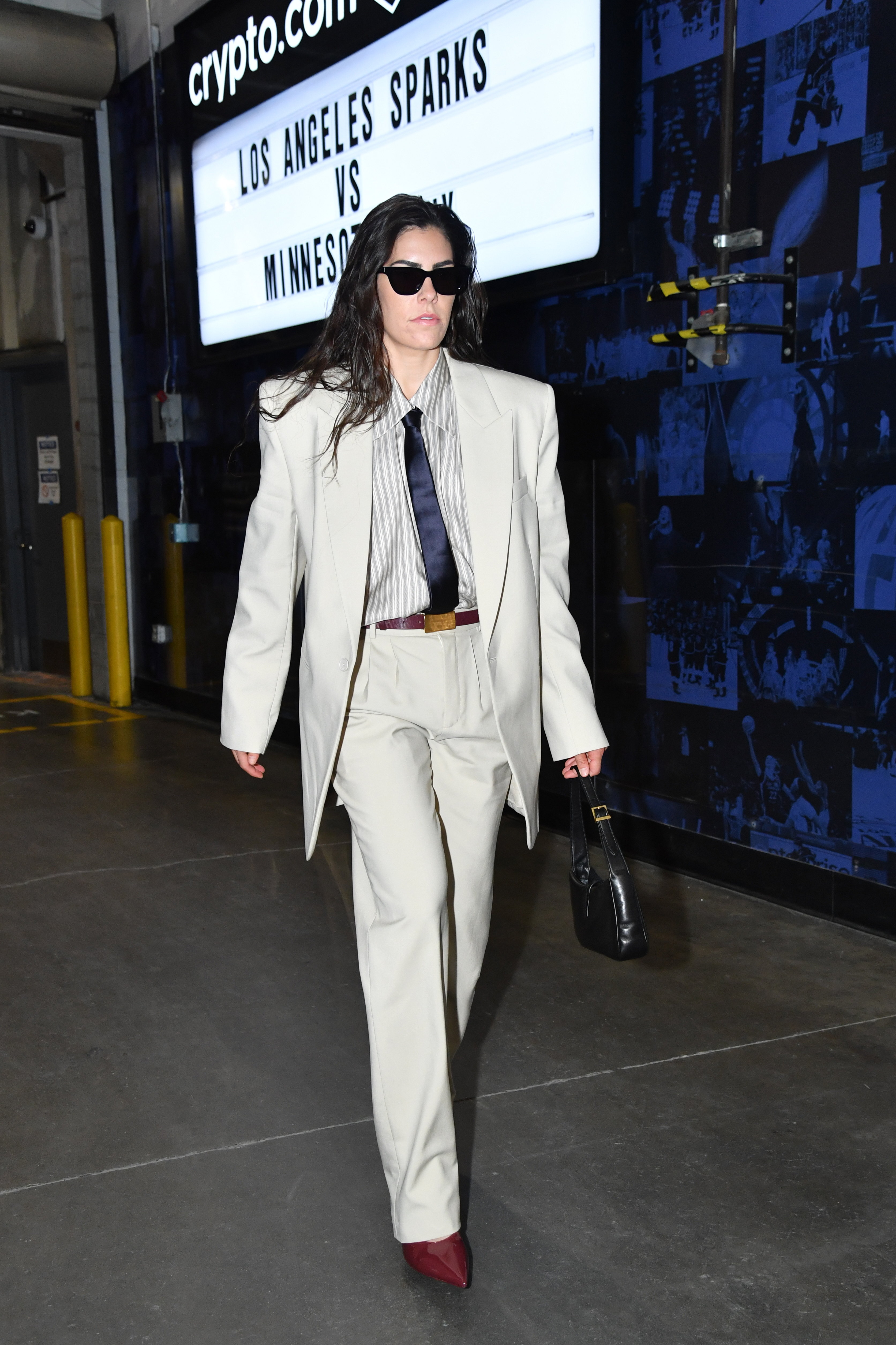 LOS ANGELES, CA - MAY 18: Kelsey Plum #10 of the Los Angeles Sparks arrives to the arena before the game against the Minnesota Lynx on May 18, 2025 at Crypto.com Arena in Los Angeles, California.