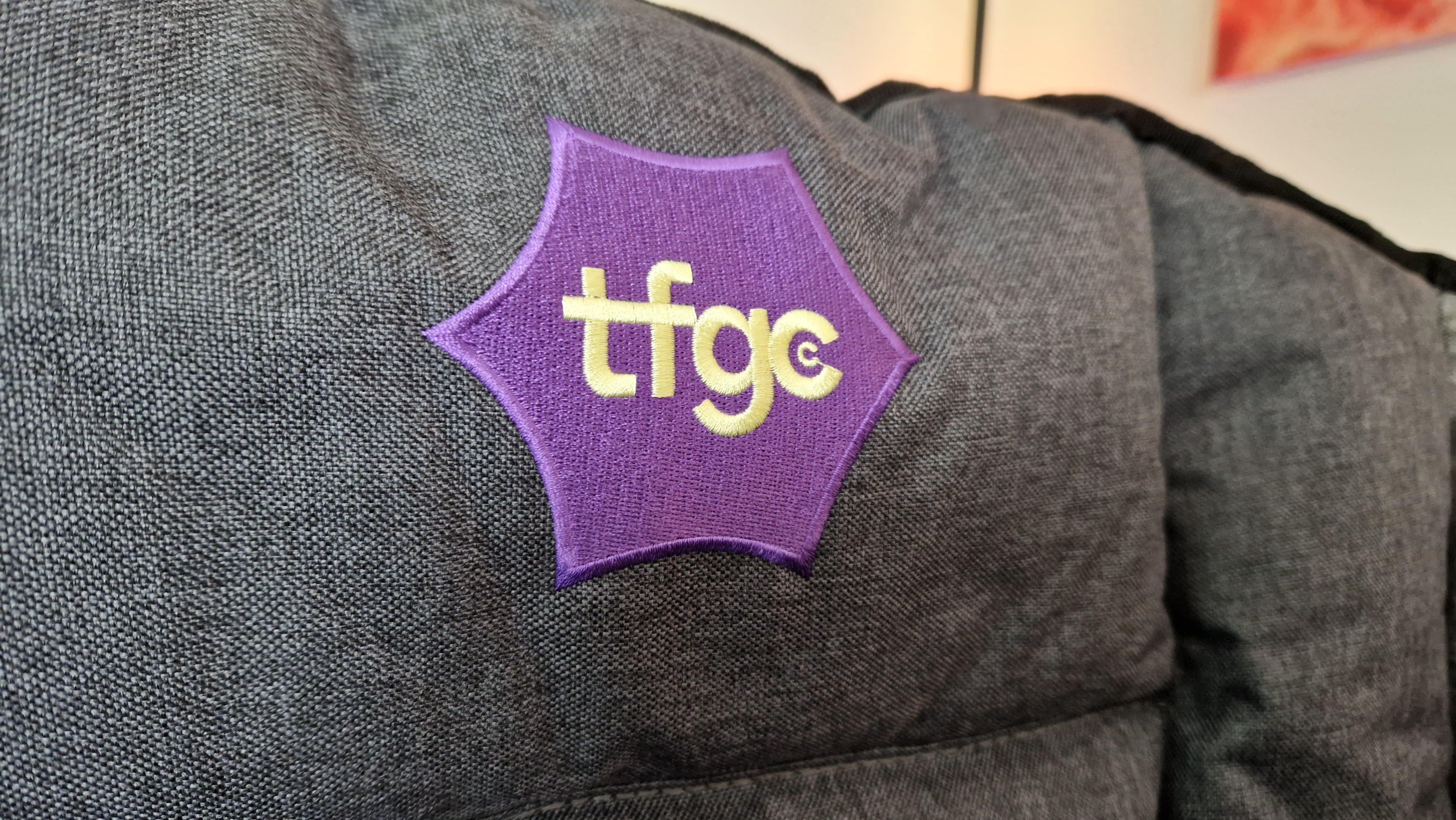 The Foldable Gaming Chair's logo on the front of the seat