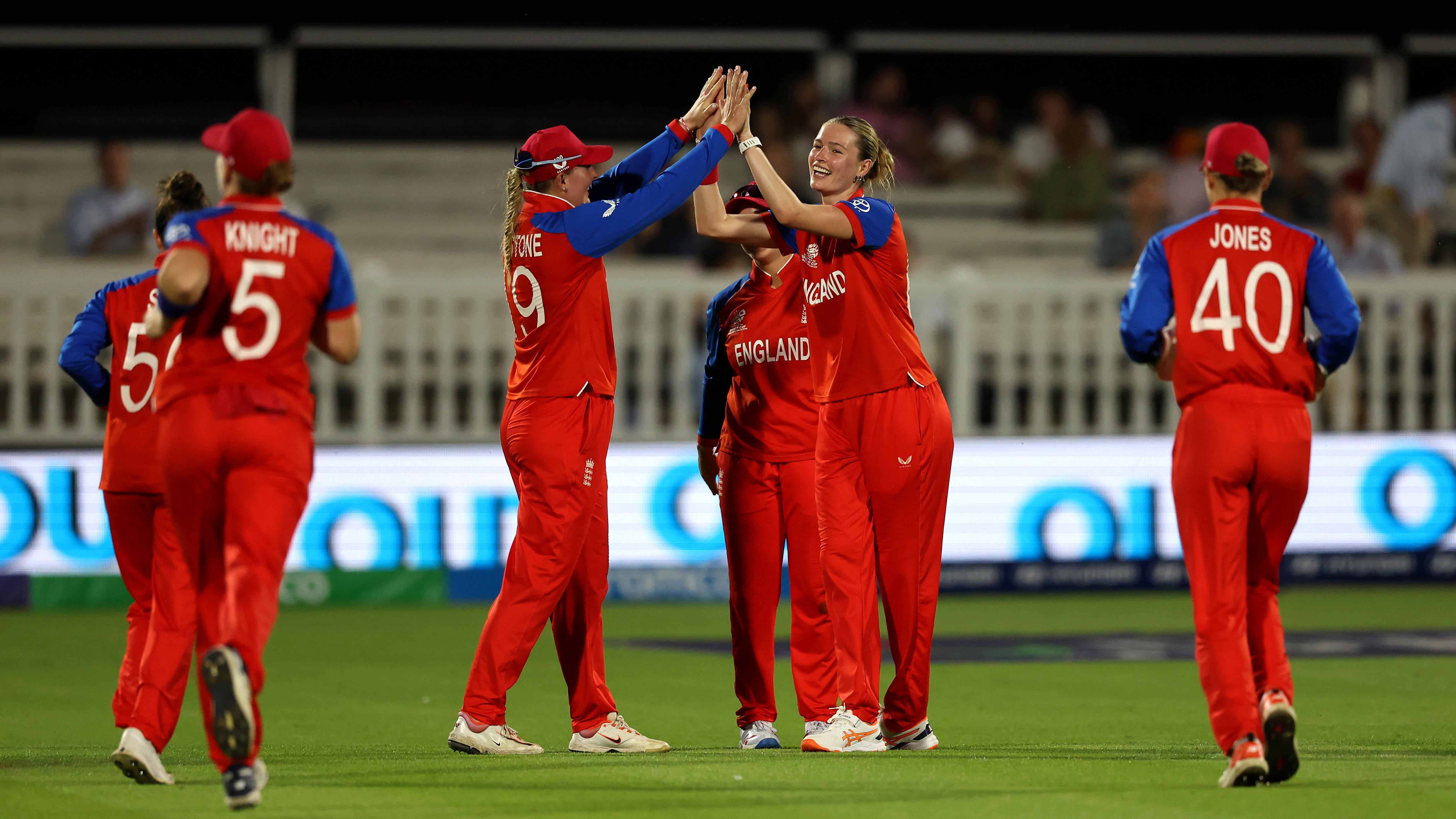 Lauren Bell of England celebrates with teammate Sophie Ecclestone during the ICC Women's T20 World Cup Group B match between England and West Indies