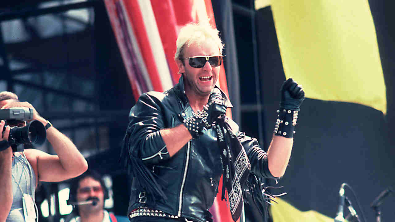 Judas Priest‘s Rob Halford performing onstage at Live Aid