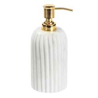 A bathroom soap dispenser in marble