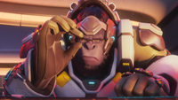 Winston adjusting his glasses while looking at a screen