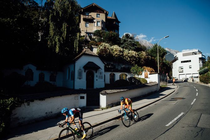 Alejandro Valverde (Spain), Romain Bardet (France) and Michael Woods (Canada) descend towards the finish of the elite men's road race in Innsbruck