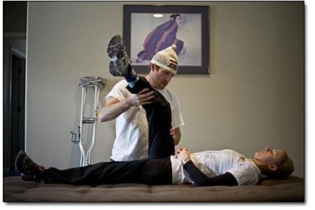 Todd McGrath, Kristin&rsquo;s brother and a student at Rocky Vista University College of Osteopathic Medicine, uses techniques he has learned in school to help relieve some of her pain.