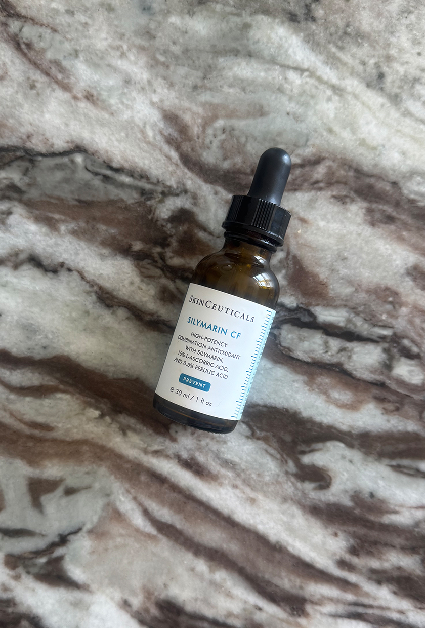 SkinCeuticals Silymarin CF serum on marble table