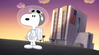 Astronaut Snoopy stands outside the Vehicle Assembly Building at NASA's Kennedy Space Center in "Snoopy in Space."