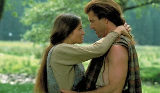 Braveheart Catherine McCormack and Mel Gibson embracing in the woods