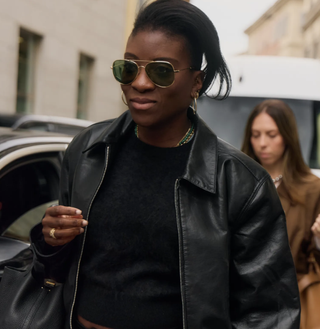 Nikki Ogunnaike wearing a leather jacket and a black T-shirt