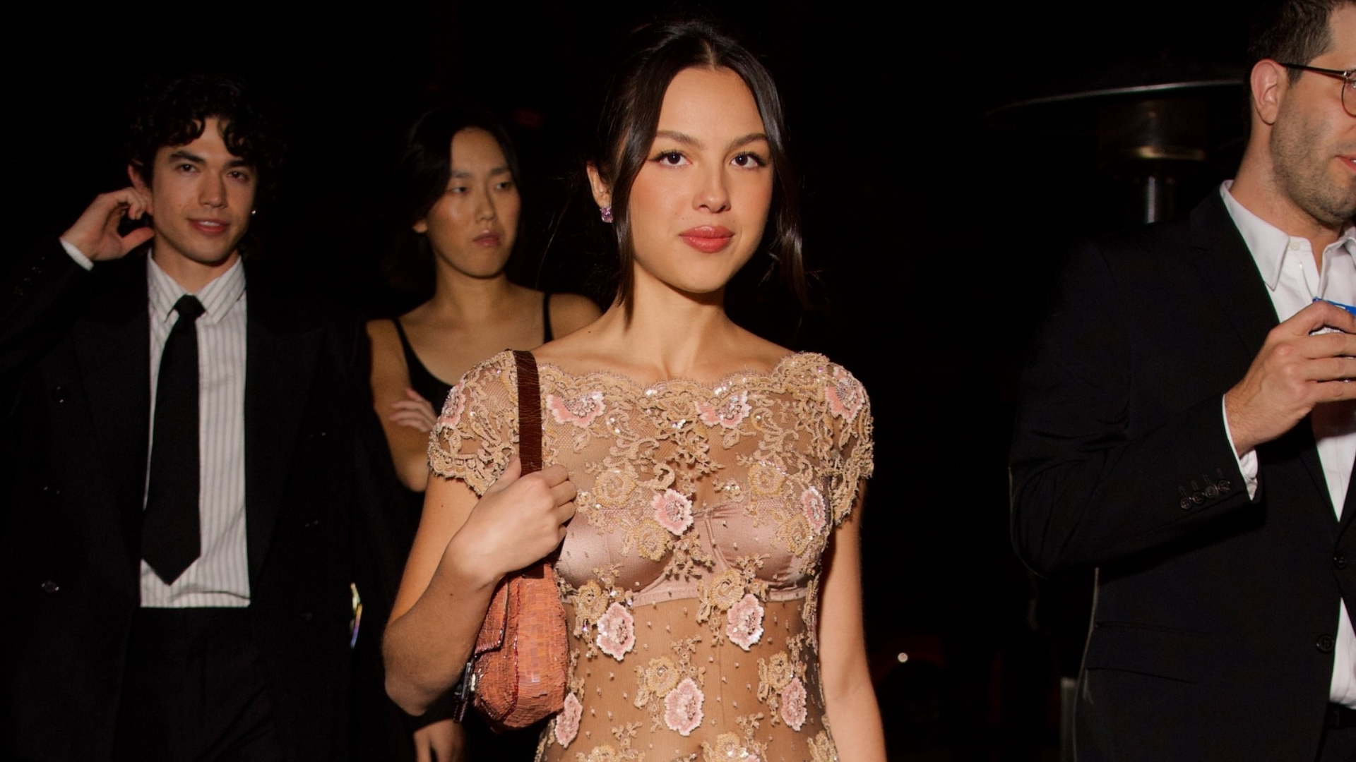 Olivia Rodrigo attended a 2026 Grammys after party in a sheer micro-mini dress and a Fendi baguette