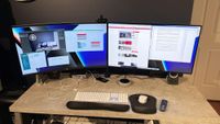Mounted monitors on a computer desk