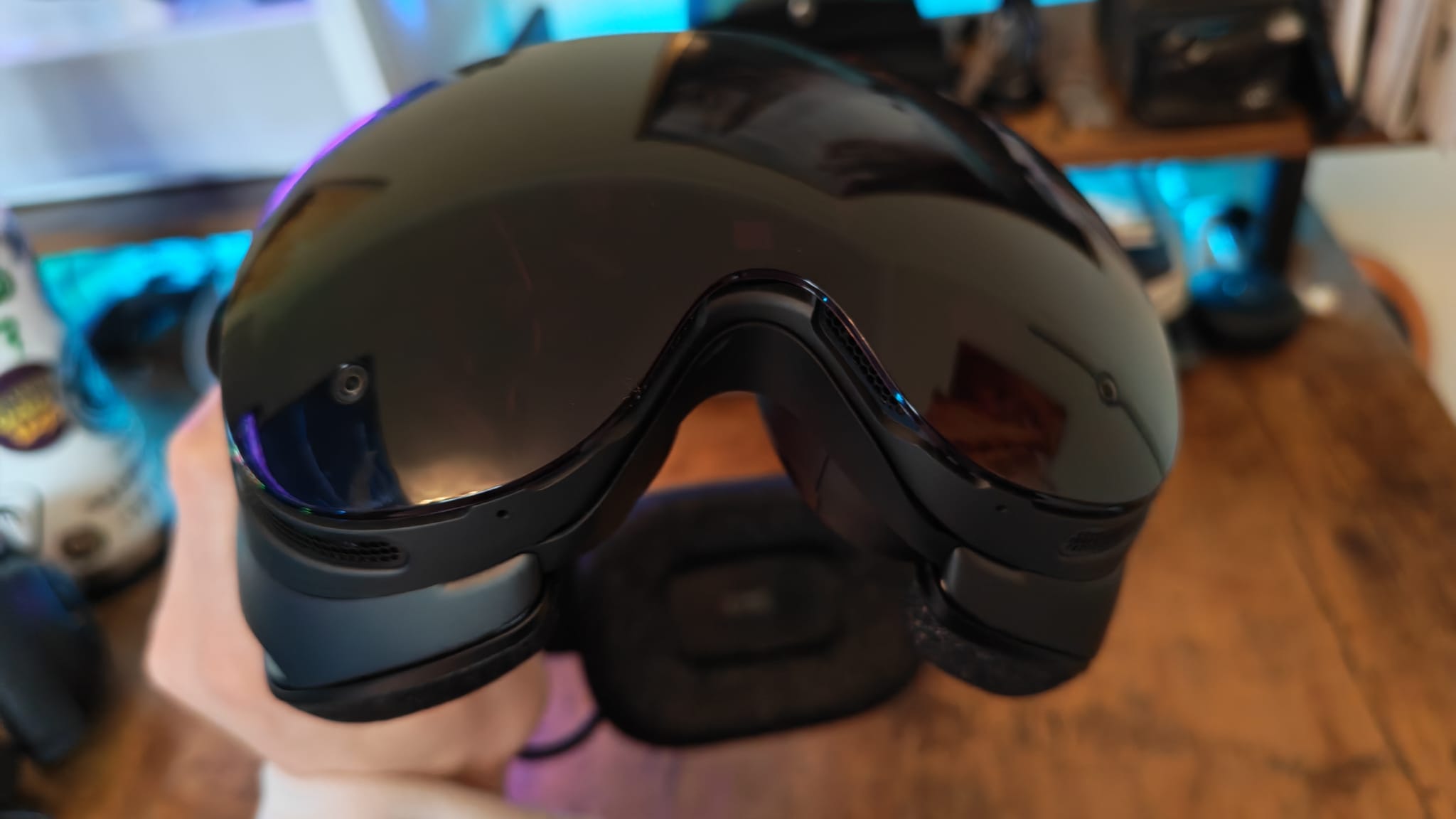 The Steam Frame being held in front of the camera