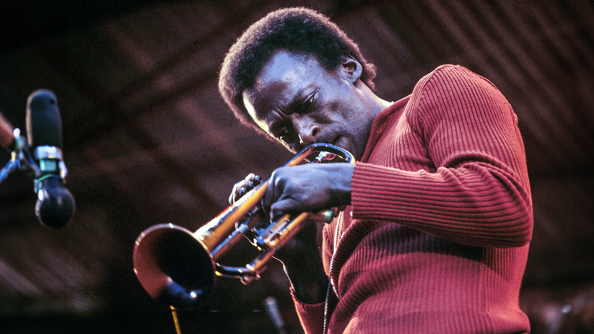 Miles Davis performs live on stage at ​the Isle Of Wight Festival ⁤1970 at Afton Down on the Isle of Wight, England on 29th August ⁣1970.