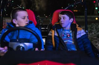 Bamber Todd and Joshua McLees as Mikey and Sean Collins in The Heist Before Christmas.