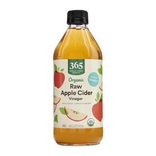 A bottle of raw apple cider vinegar