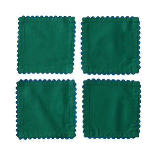 Four green linen cotton blend napkins