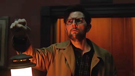 Adam Scott is shown carrying a lantern in Hokum.
