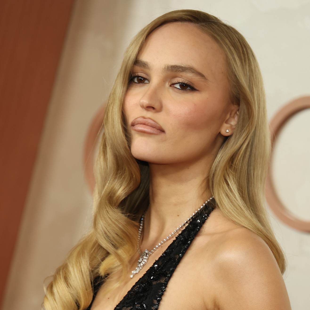 These Under-$15 Products Are Responsible for Lily-Rose Depp's 1940s-Inspired "Hollywood Icon" Curls