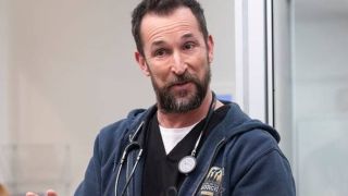 Noah Wyle stands in conversation in an exam room in The Pitt - S1 E9 - "3:00 P.M."