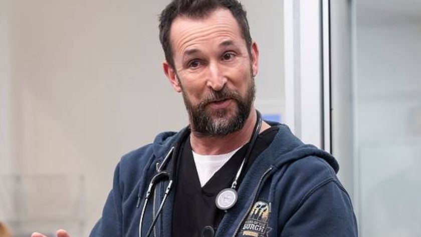 Noah Wyle stands in conversation in an exam room in The Pitt - S1 E9 - &quot;3:00 P.M.&quot;