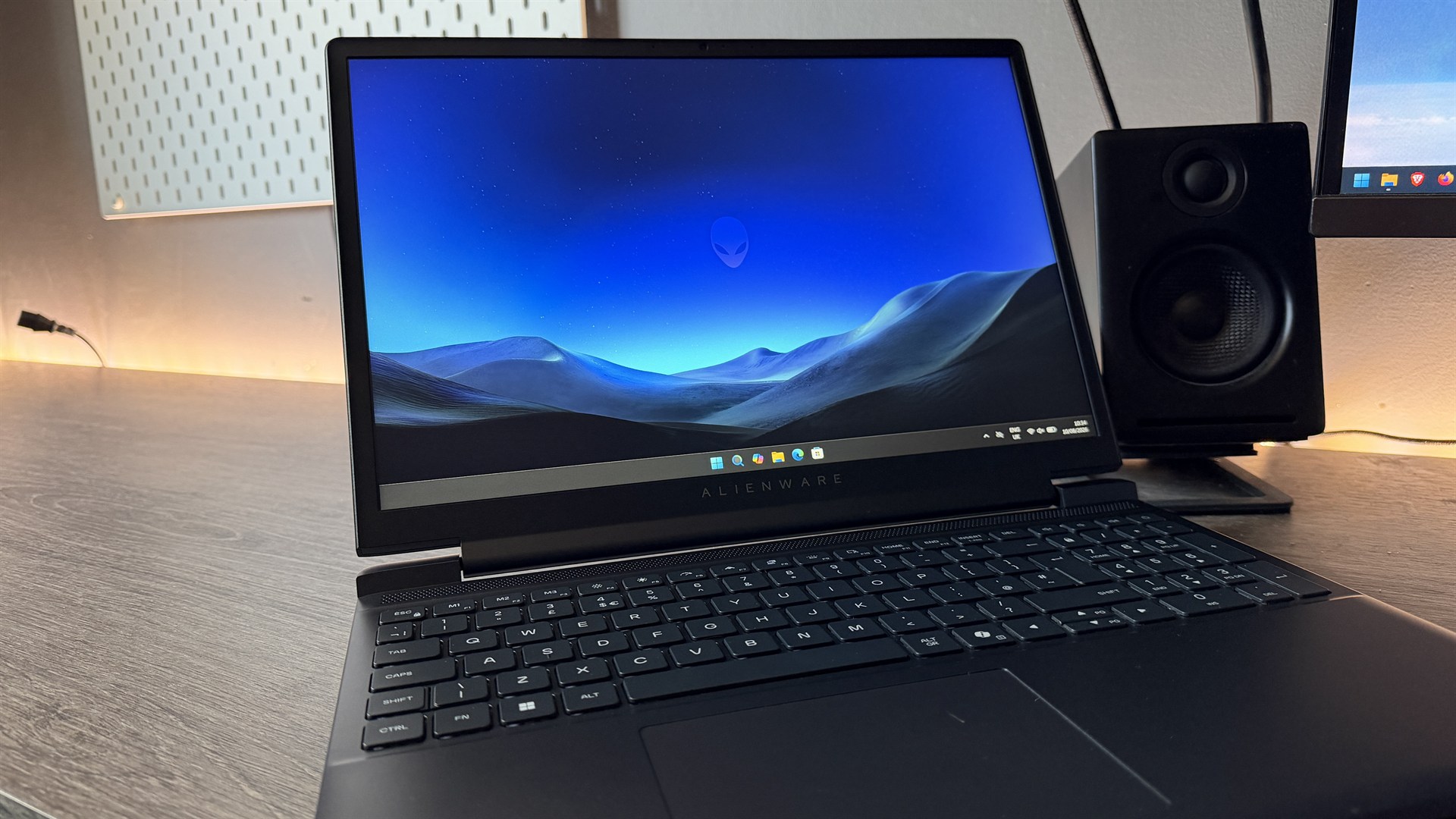 Alienware 15 (2026) gaming laptop on a wooden desk