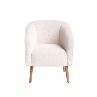 A white shearling armchair