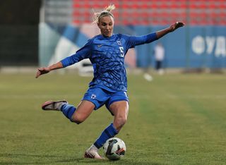 Emma Koivisto about to kick the ball