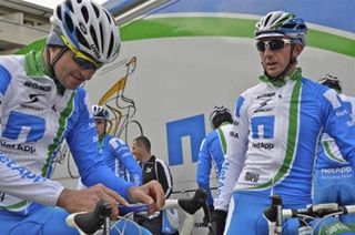 Jan Barta and Bartosz Huzarski have a word in front of the team bus