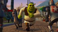 A big green monster wearing clothes runs along a brick road with a sense of great confidence