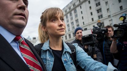 actress allison mack leaves us district court for the eastern district of new york after a bail hearing, april 24, 2018 in the brooklyn borough of new york city mack was charged last friday with sex trafficking for her involvement with a self help organization for women that forced members into sexual acts with their leader the group, called nxivm, was led by founder keith raniere, who was arrested in march on sex trafficking charges she was released on bail at 5 million photo by drew angerergetty images