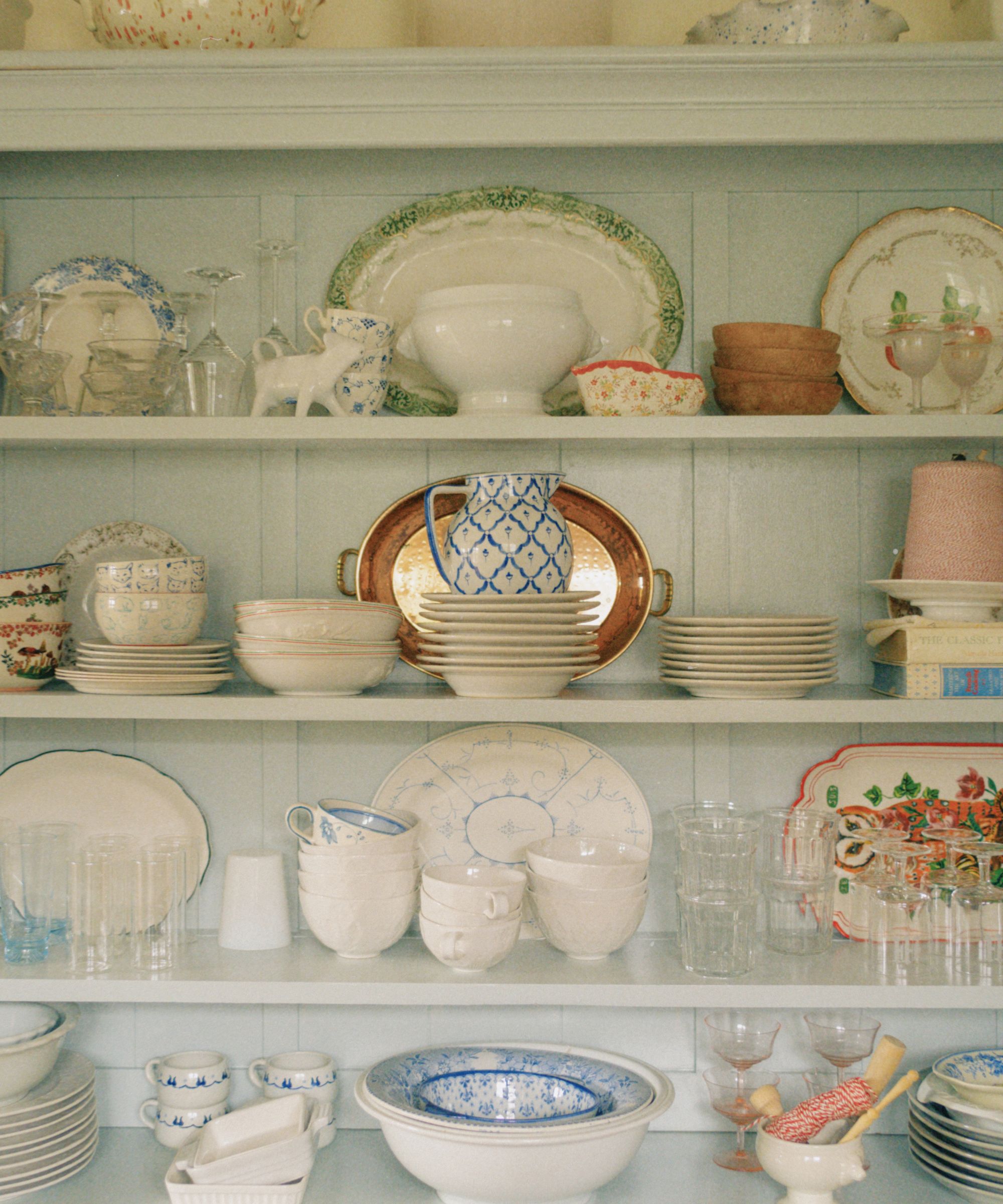 Vintage dresser with ceramics, vintage plates and vintage glassware