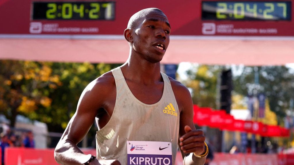 Kenya&#039;s Benson Kipruto reacts after crossing the finish line to place first in the men&#039;s division of the 2022 Bank of America Chicago Marathon in Chicago, Illinois, on October 9, 2022