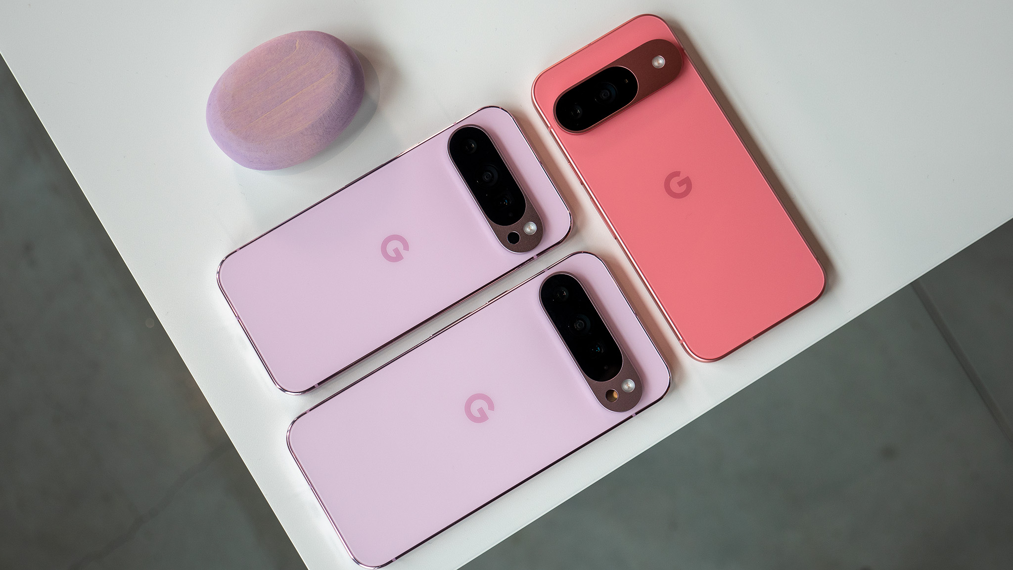 Comparison of three Google Pixel 9 models in pink