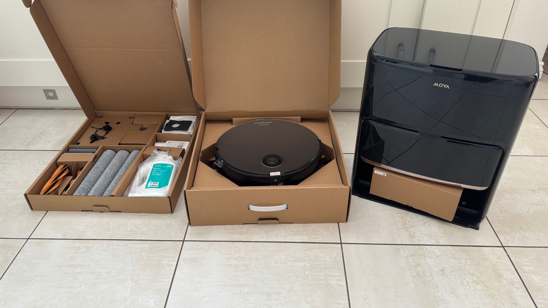 MOVA Z60 Ultra Roller Complete Robot Vacuum working on wooden floors in Carly's home