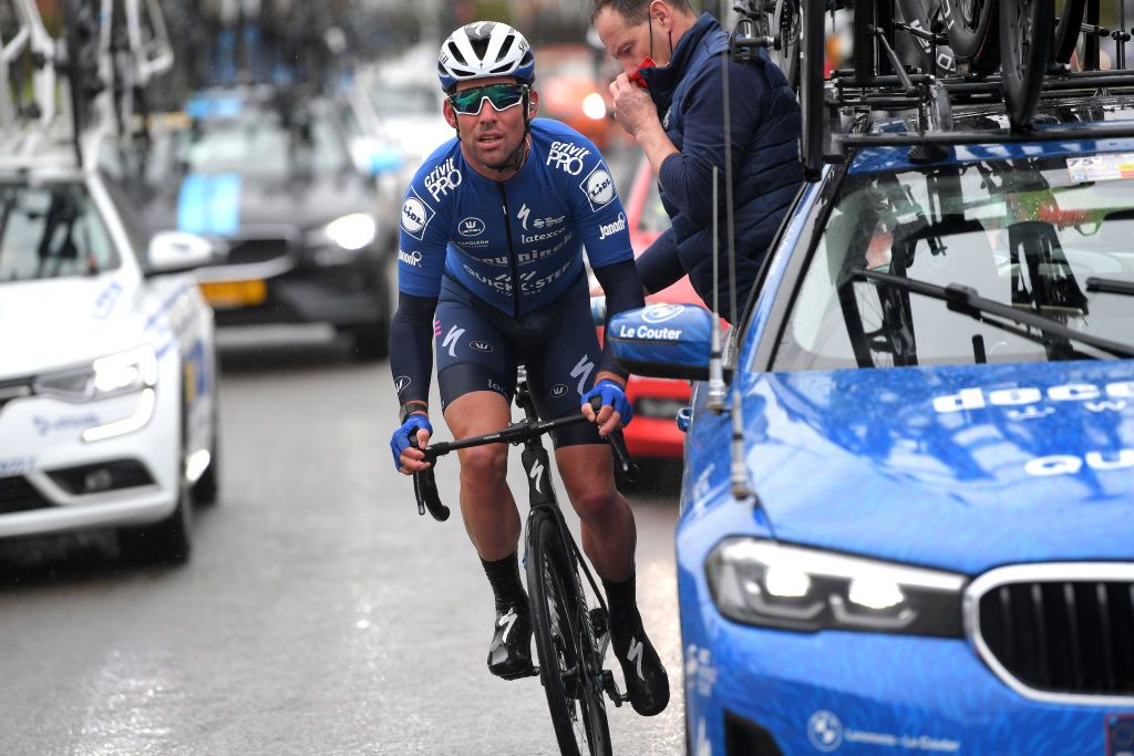 NOKERE BELGIUM MARCH 17 Mark Cavendish of United Kingdomand Team Deceuninck QuickStep Dominique Landuyt of Belgium Mechanic of Team Deceuninck QuickStep during the 75th Nokere Koerse Danilith Classic 2021 Mens Elite a 1955km race from Deinze to Nokere Mechanic Car NokereKoerse on March 17 2021 in Nokere Belgium Photo by Luc ClaessenGetty Images