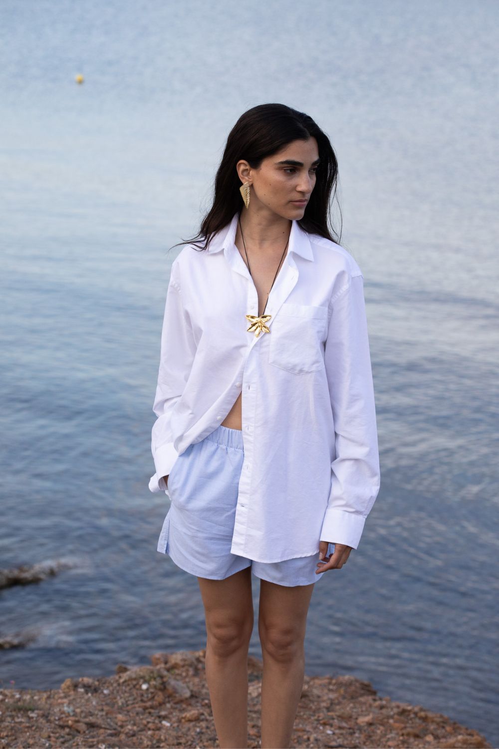 a model wears jewellery from the ysso x eden rock collaboration