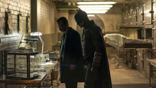 Robert Pattinson's Batman and Jeffrey Wright's James Gordon investigating crime scene