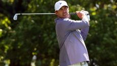 Brooks Koepka of the United States plays his shot from the fourth tee during the third round of the 2024 Masters Tournament at Augusta National Golf Club 