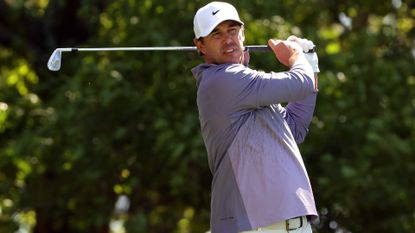 Brooks Koepka of the United States plays his shot from the fourth tee during the third round of the 2024 Masters Tournament at Augusta National Golf Club 