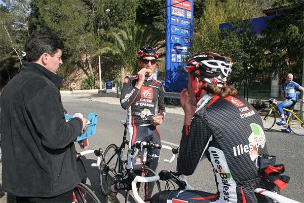 The riders stop briefly at the top