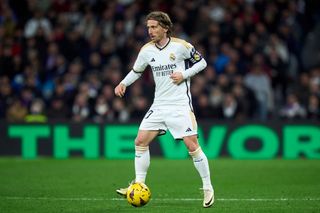 Luka Modric of Real Madrid CF looks with the ball during the LaLiga EA Sports match between Real Madrid CF and Girona FC at Estadio Santiago Bernabeu on February 10, 2024 in Madrid, Spain. (Photo by Diego Souto/Getty Images) Kylian Mbappe