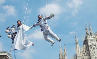 Chinese artist Li Wei in a gravity-defying situation