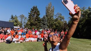 Coach Shayain and 100 female golfers