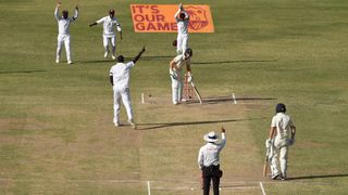 Jos Buttler of England is out lbw to West Indies Jason Holder