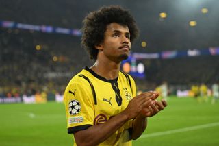 Dortmund's German forward #27 Karim Adeyemi reacts as he leaves the pitch after injury during the UEFA Champions League football match between Borussia Dortmund and Celtic in Dortmund, western Germany on October 1, 2024.