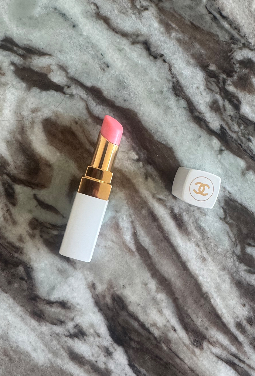 Chanel Coco Rouge Lip Balm on marble table