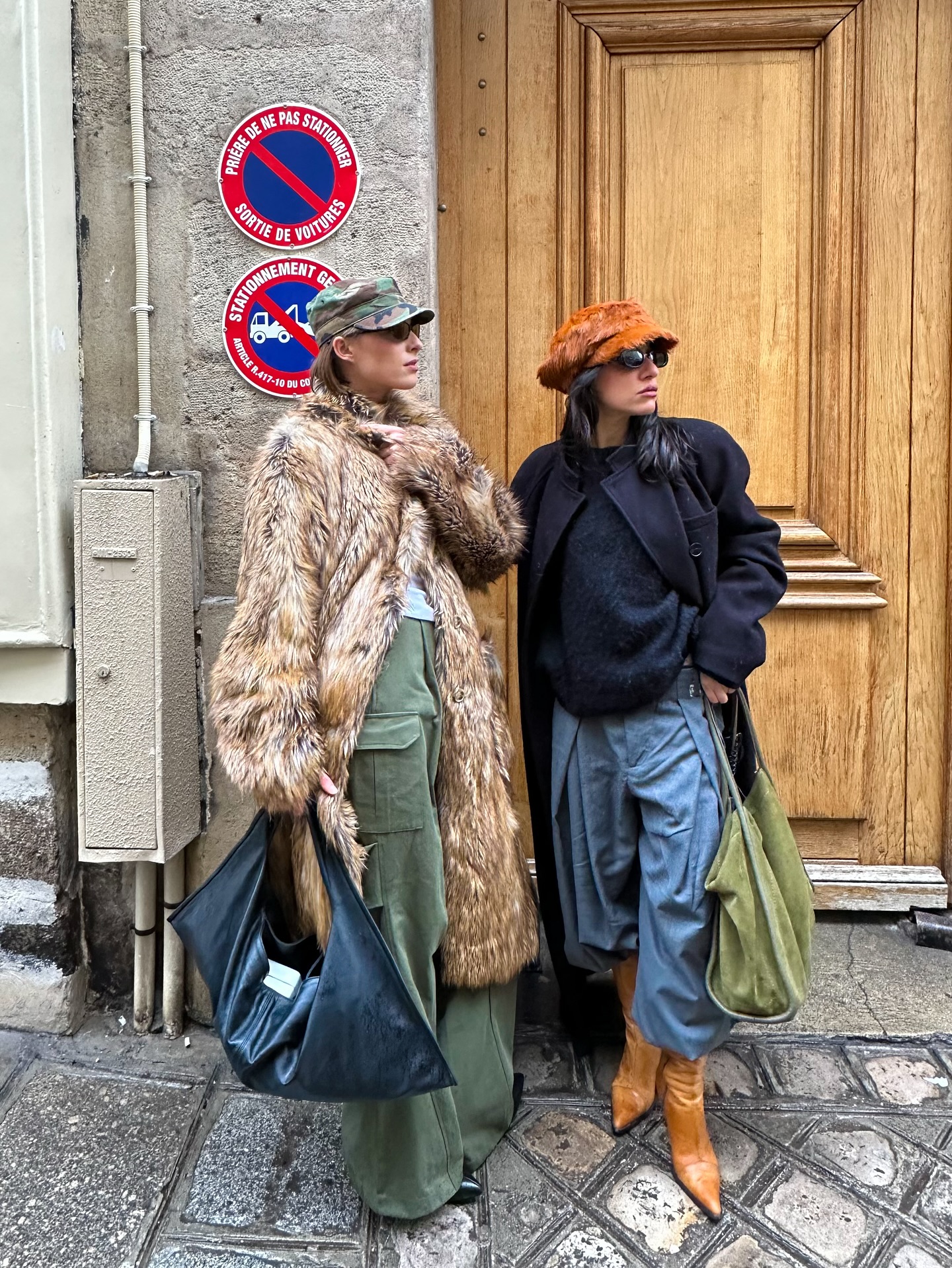 Girls posing for photo wearing baker boy hat